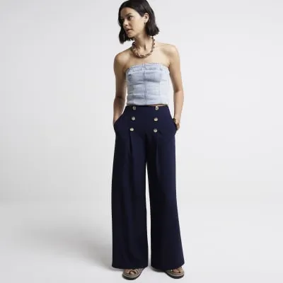 Navy button detail wide leg trousers sold by River Island