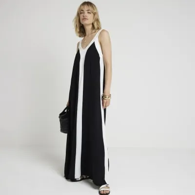 Black colour block swing maxi dress sold by River Island