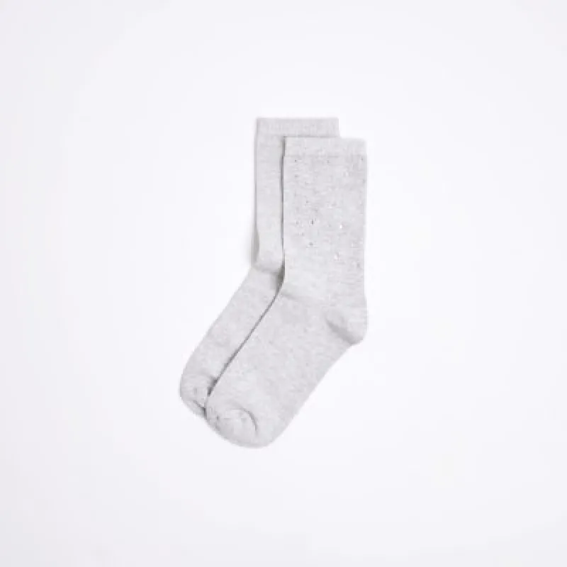 Grey diamante embellished socks sold by River Island