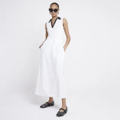 White ribbed collared bodysuit sold by River Island