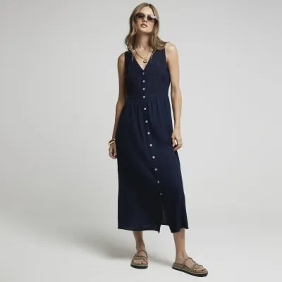 Navy linen blend embroidered smock midi dress sold by River Island