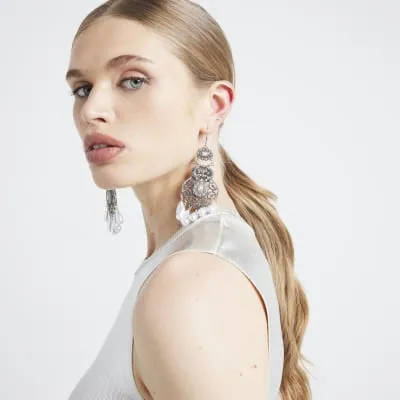 Silver pearl pendant drop earrings sold by River Island