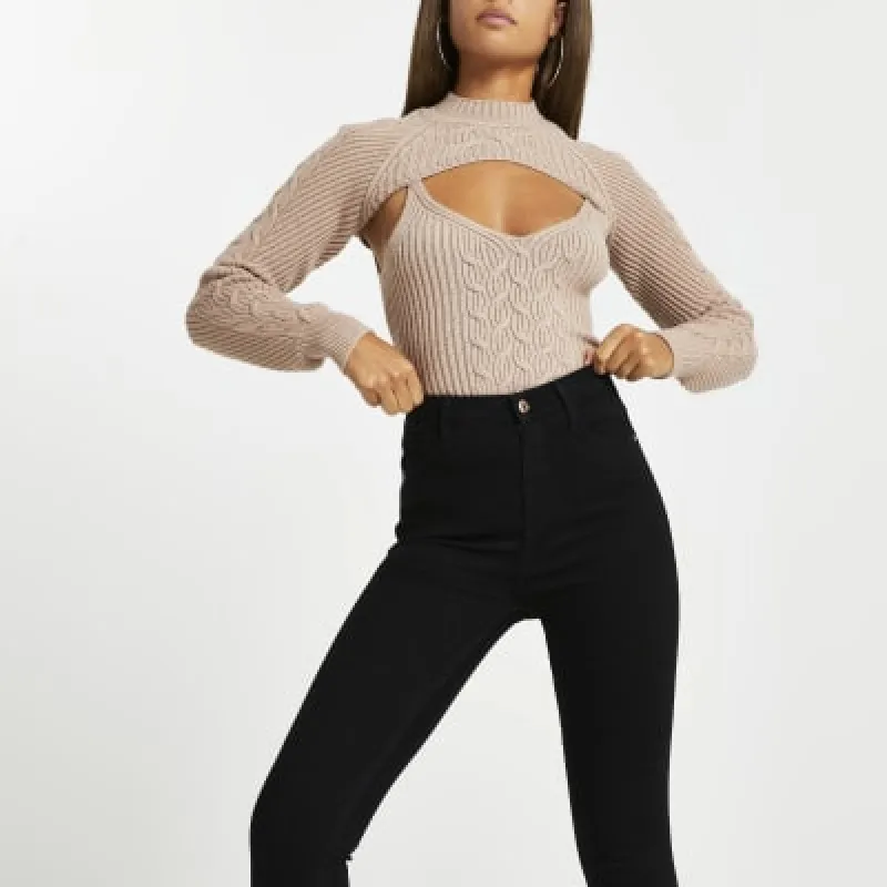 Black high waisted skinny jeans sold by River Island