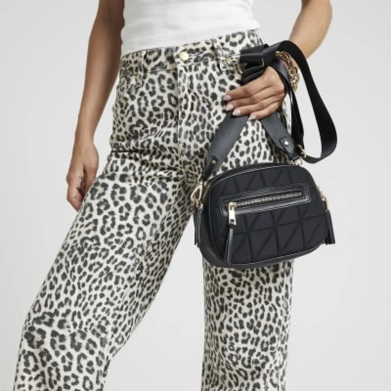 Black quilted cross body camera bag sold by River Island