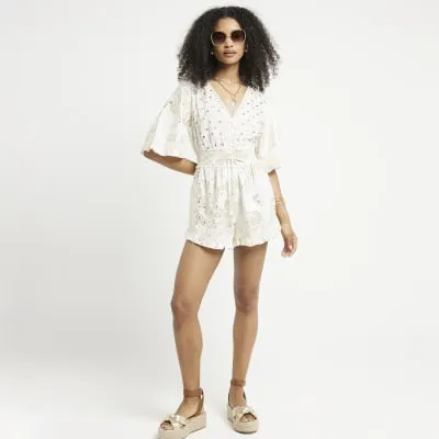 Cream paisley embellished playsuit sold by River Island