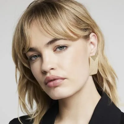 Gold Textured Large Stud Earrings sold by River Island