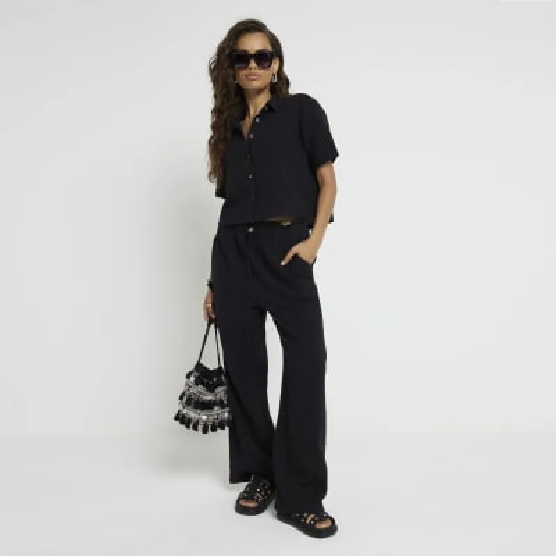Petite Black Textured Trousers sold by River Island