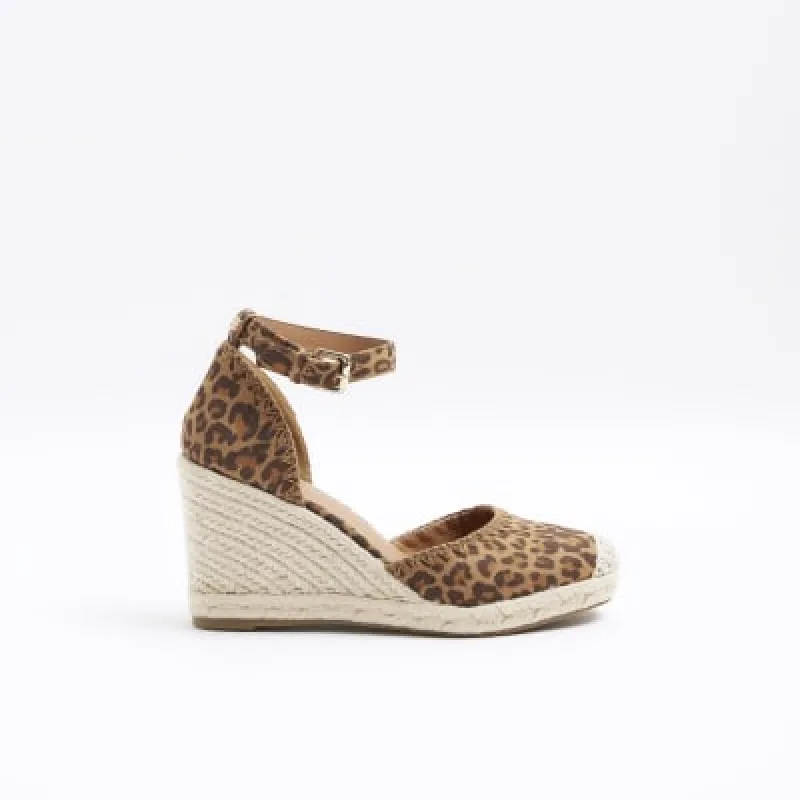 Brown leopard print espadrille wedge sandals sold by River Island