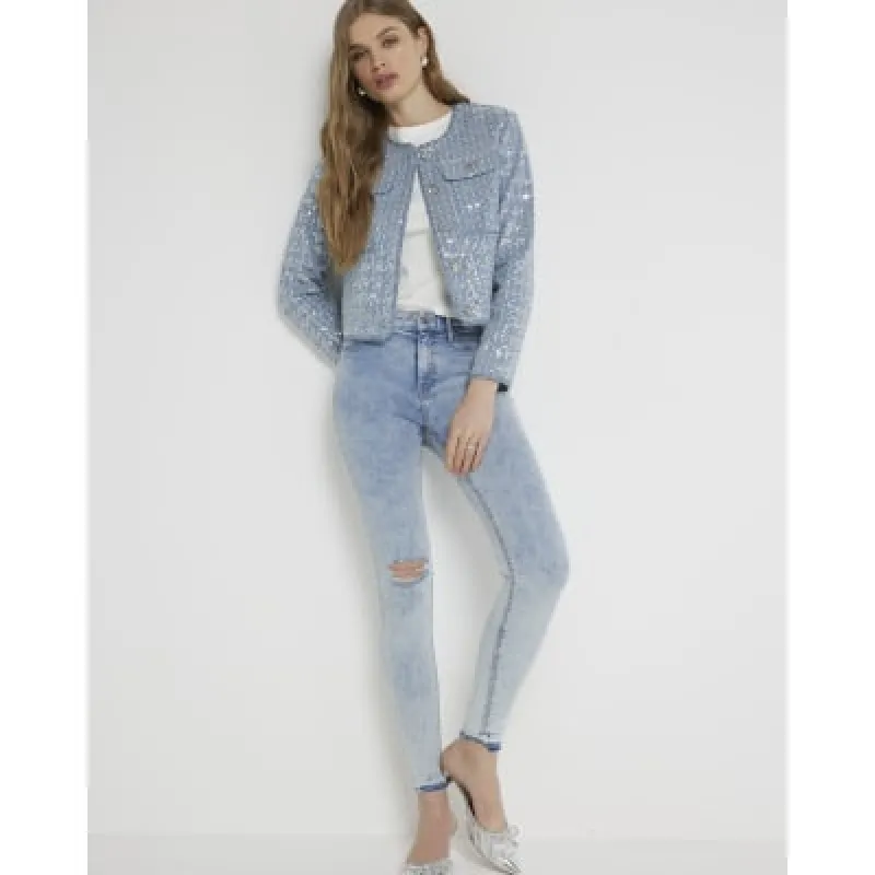 Blue Molly mid rise bum sculpt jeggings sold by River Island