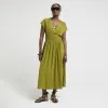 Khaki linen blend shirred skater midi dress sold by River Island