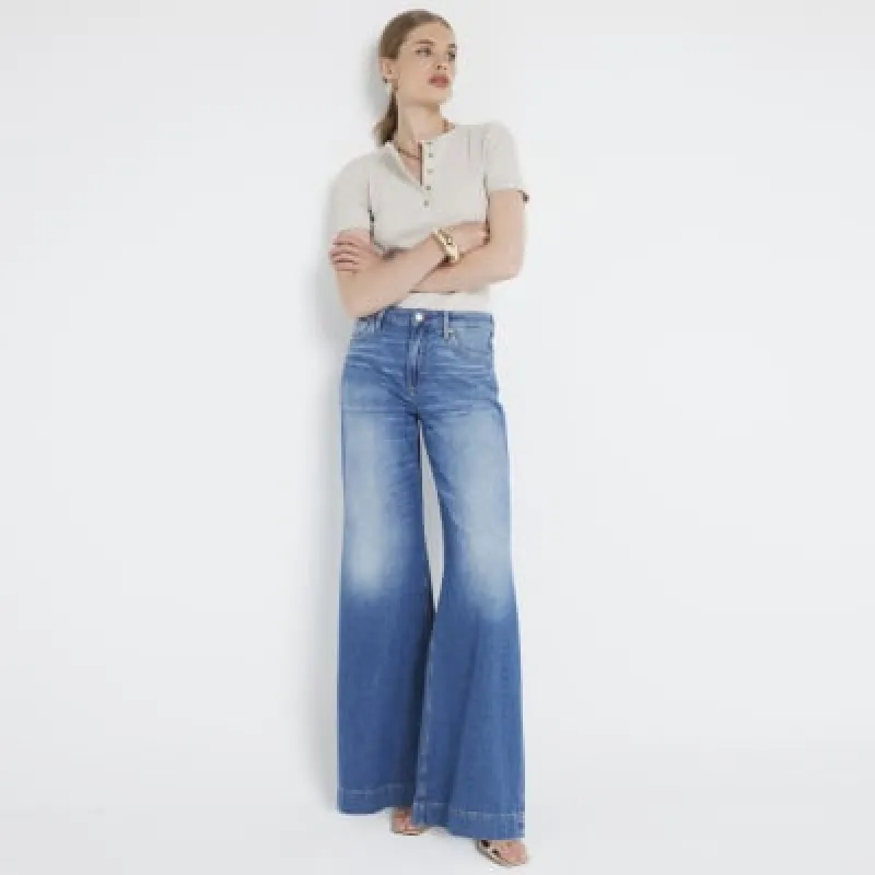 Blue mid rise wide leg jeans made by River Island