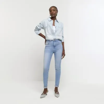 Blue high waisted bum sculpt skinny jeans sold by River Island