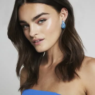 Blue domed earrings sold by River Island