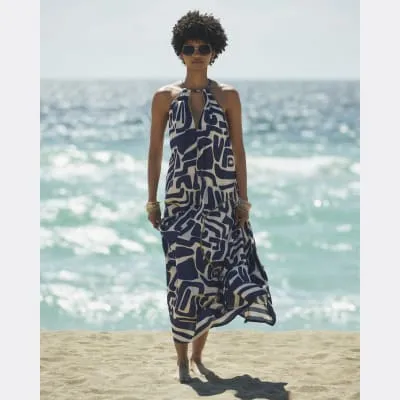 Navy abstract halter neck beach maxi dress sold by River Island