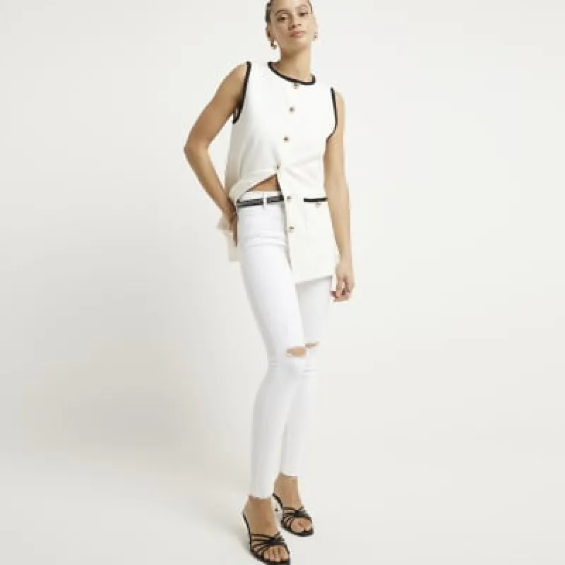 White mid rise molly sculpted jeans sold by River Island