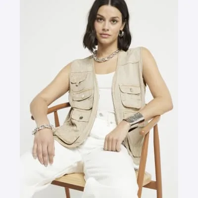 Beige jacquard fisherman gilet sold by River Island