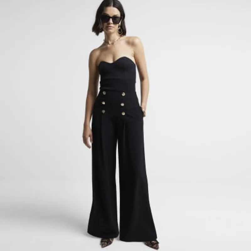 Black button detail wide leg trousers sold by River Island