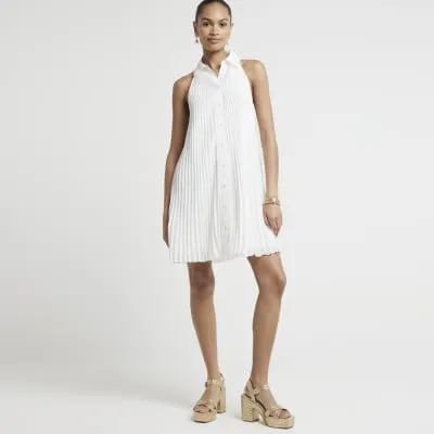 Cream plisse sleeveless mini shirt dress sold by River Island