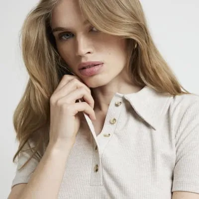 Beige ribbed polo t-shirt sold by River Island