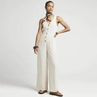Beige linen blend jumpsuit sold by River Island