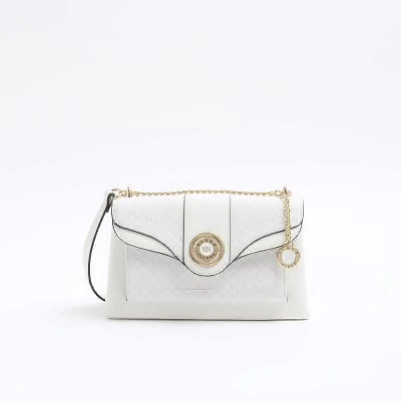 White RI monogram chain shoulder bag sold by River Island