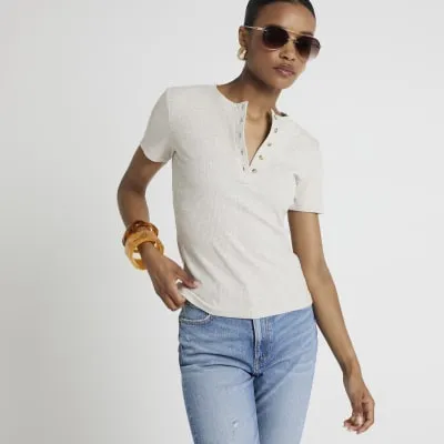 Beige ribbed button t-shirt sold by River Island