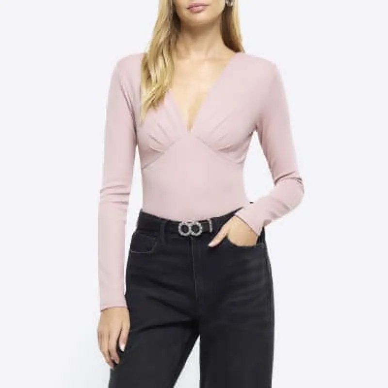 Pink plunge long sleeve bodysuit sold by River Island