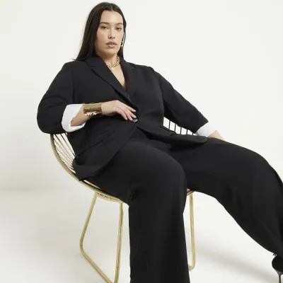 Plus black wide leg trousers sold by River Island