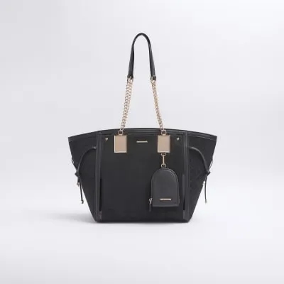 Black suedette wing pouch tote bag sold by River Island