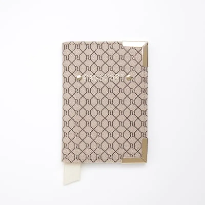 Brown RI monogram passport cover sold by River Island