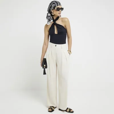 Cream Pleated Wide Leg Trousers sold by River Island