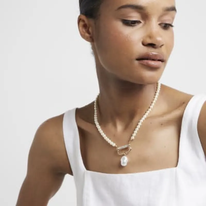 Gold Pearl Carabiner Choker Necklace sold by River Island