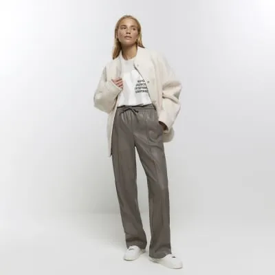 Grey faux leather wide leg trousers sold by River Island