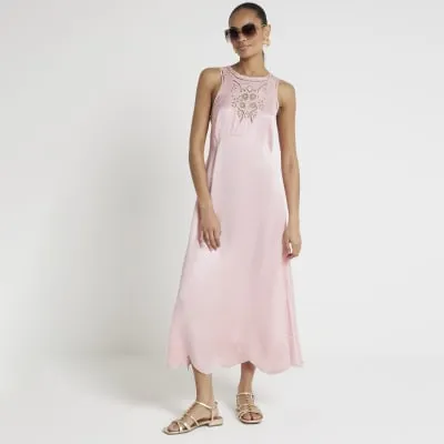 Pink broderie slip midi dress sold by River Island