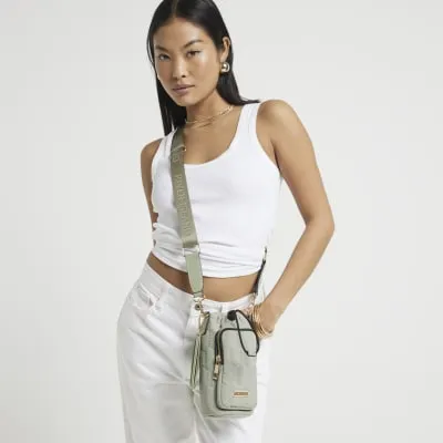 Green quilted bottle holder bag sold by River Island