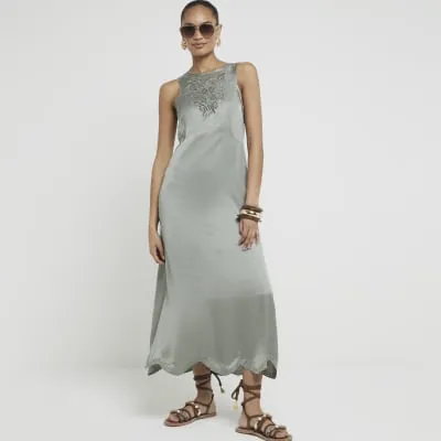 Khaki broderie slip midi dress sold by River Island