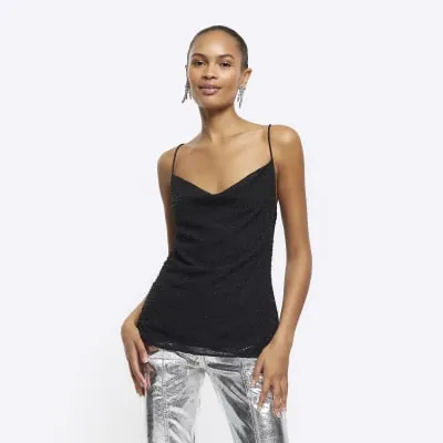 Black chiffon beaded cami top sold by River Island