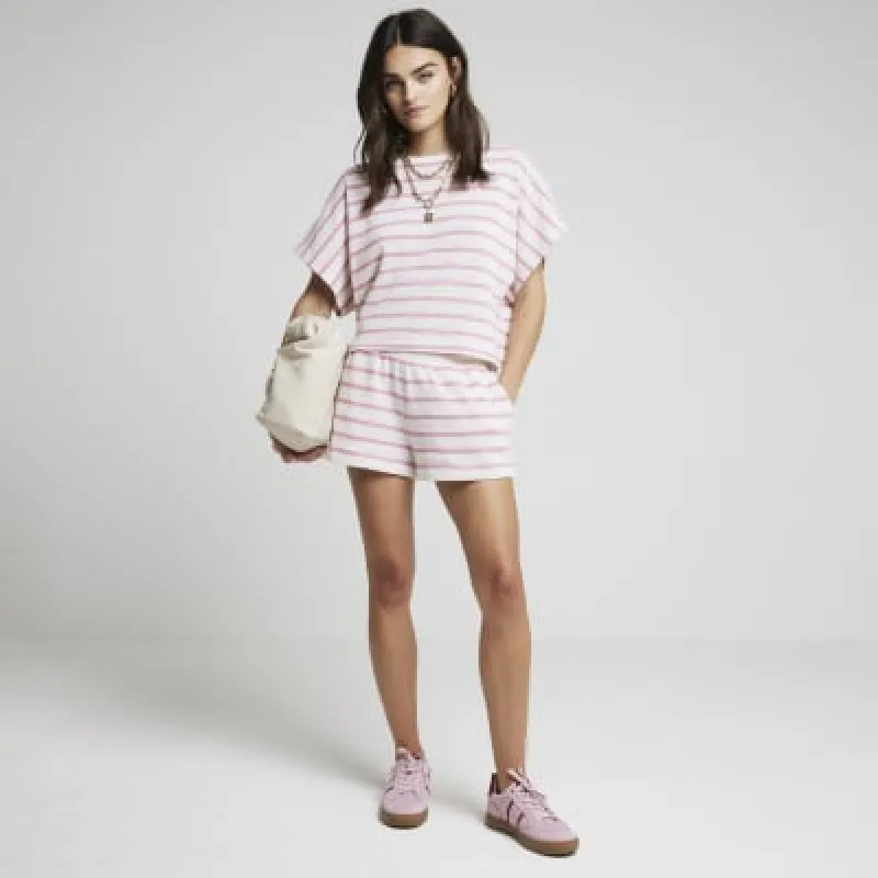 Pink crochet stripe top sold by River Island