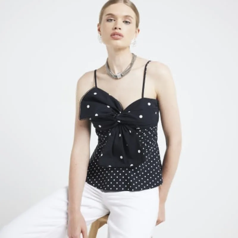 Black Bow spot Peplum Cami top sold by River Island