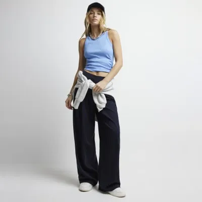 Blue ribbed racer vest top sold by River Island