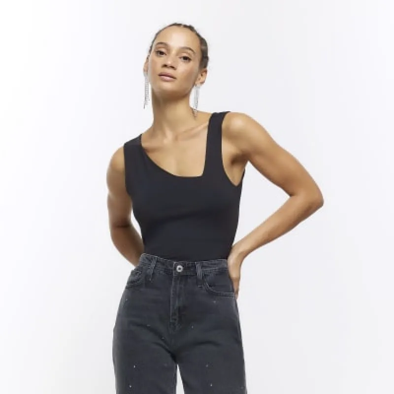 Black asymmetric neck tank top sold by River Island