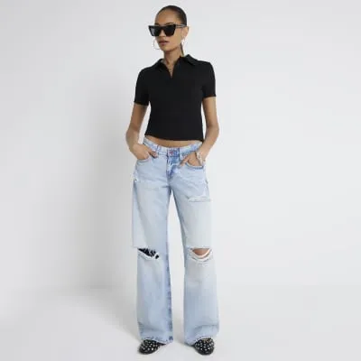 Blue low waist baggy wide ripped jeans sold by River Island