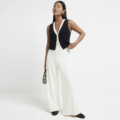 Petite Cream Wide Leg Trousers sold by River Island