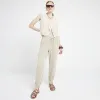 Beige lyocell elasticated joggers sold by River Island