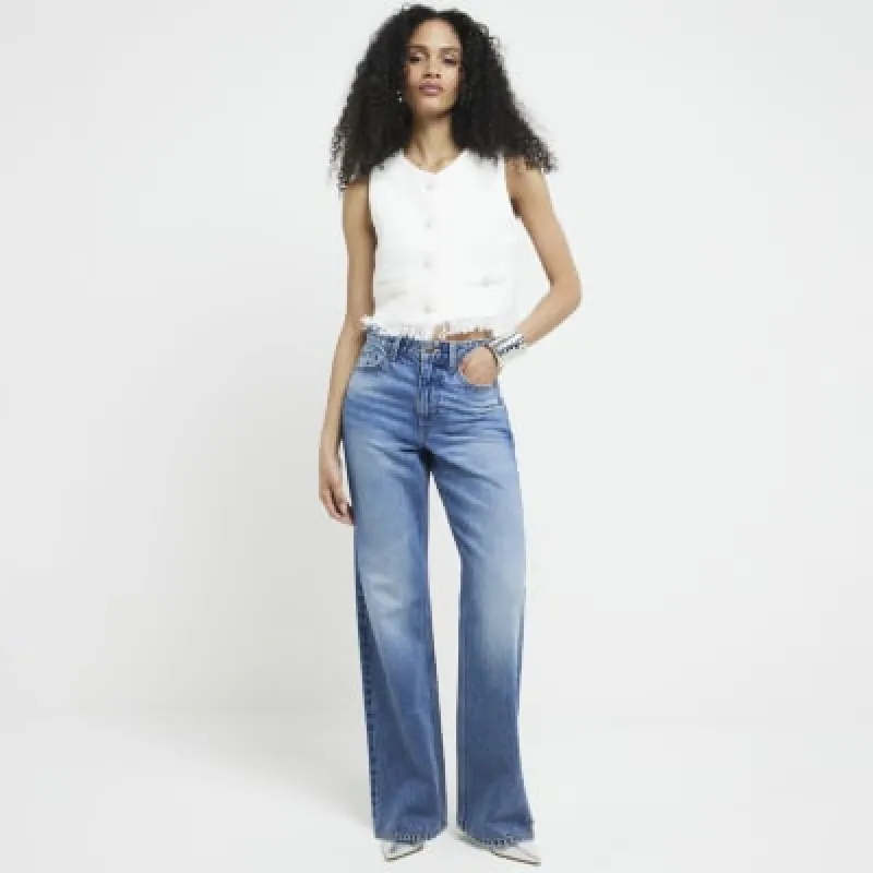 Blue high waisted relaxed straight jeans sold by River Island