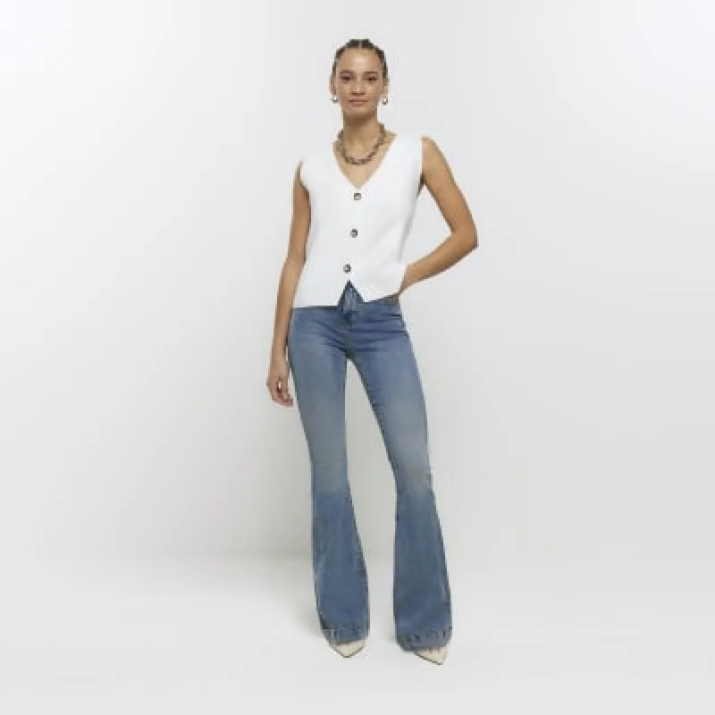 Blue high waisted tummy hold flare jeans sold by River Island