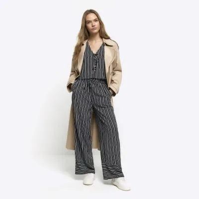 Black stripe wide leg trousers sold by River Island