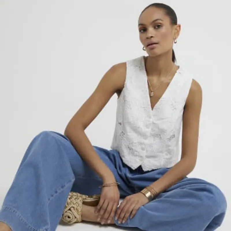 White floral broderie waistcoat sold by River Island
