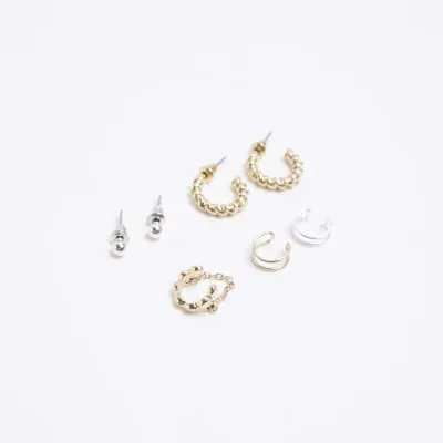 Gold colour cuff earrings multipack sold by River Island