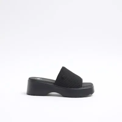 Black knit flatform sandals sold by River Island